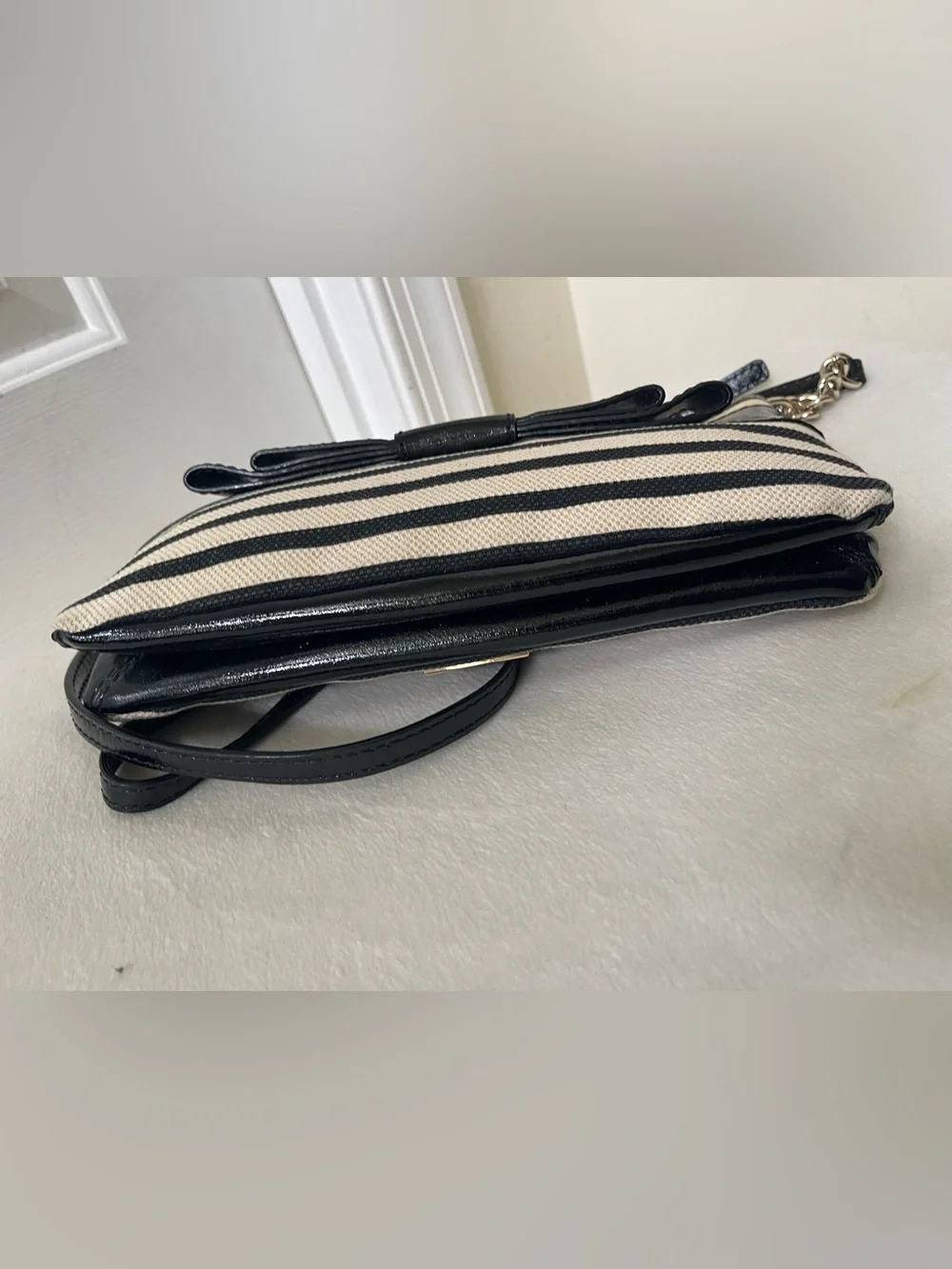 kate spade Black and Cream Striped Crossbody with Bow Detail